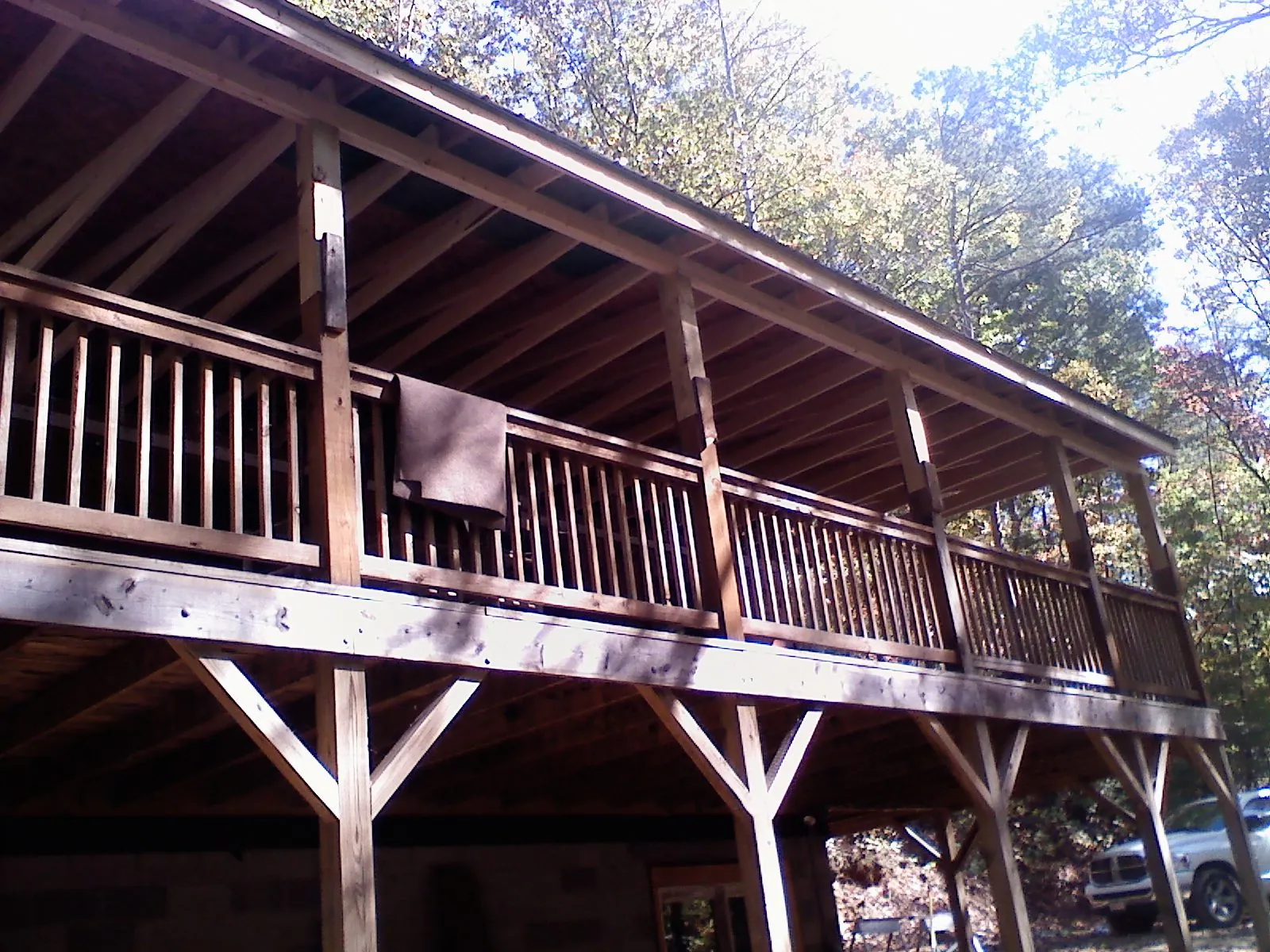 Timber framing under a new elevated porch and deck — Roof Leak Repair in Cheyenne by Roofing Brothers